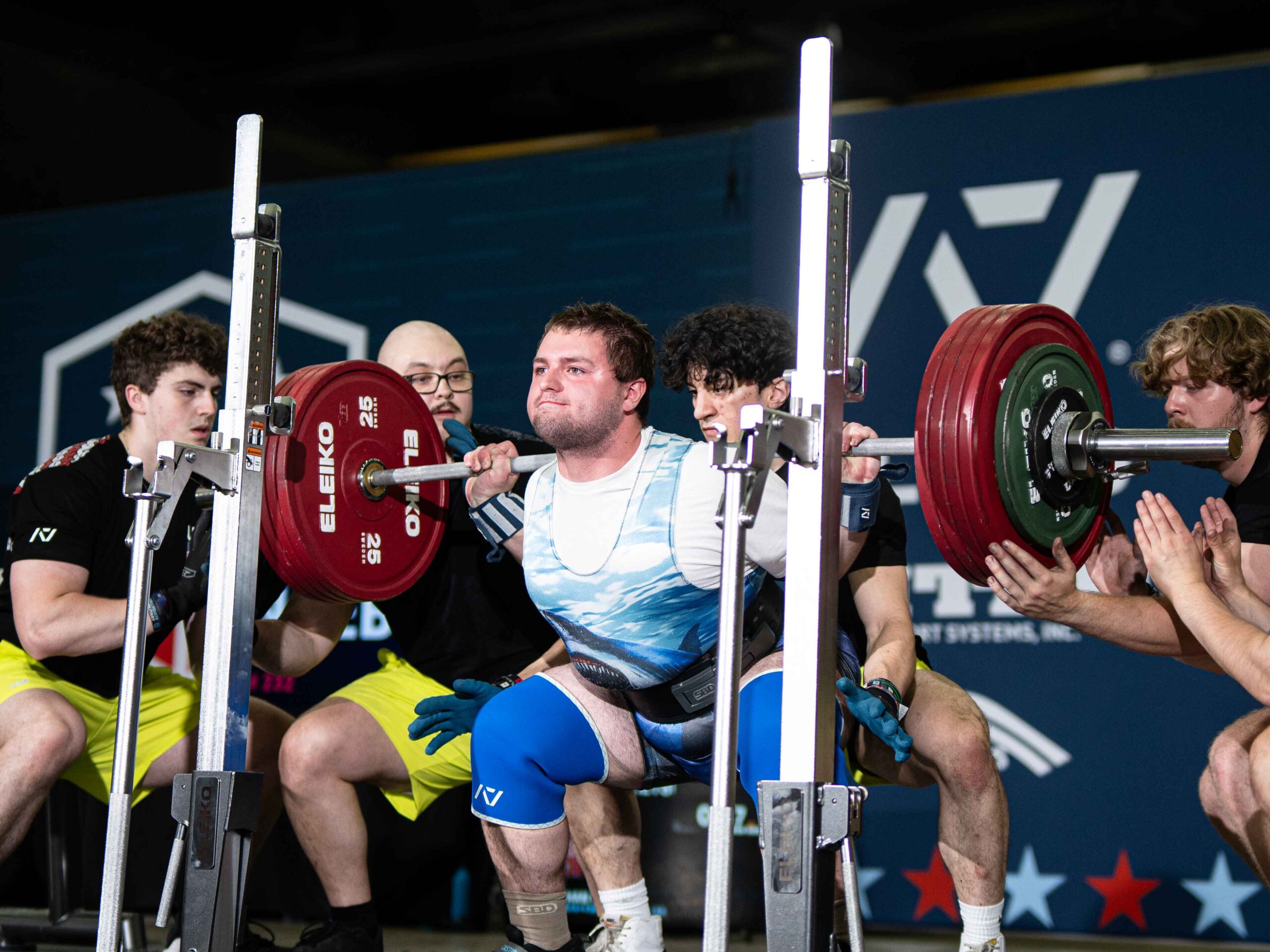 A Special Olympics athlete squats at a Powerlifting America meet.